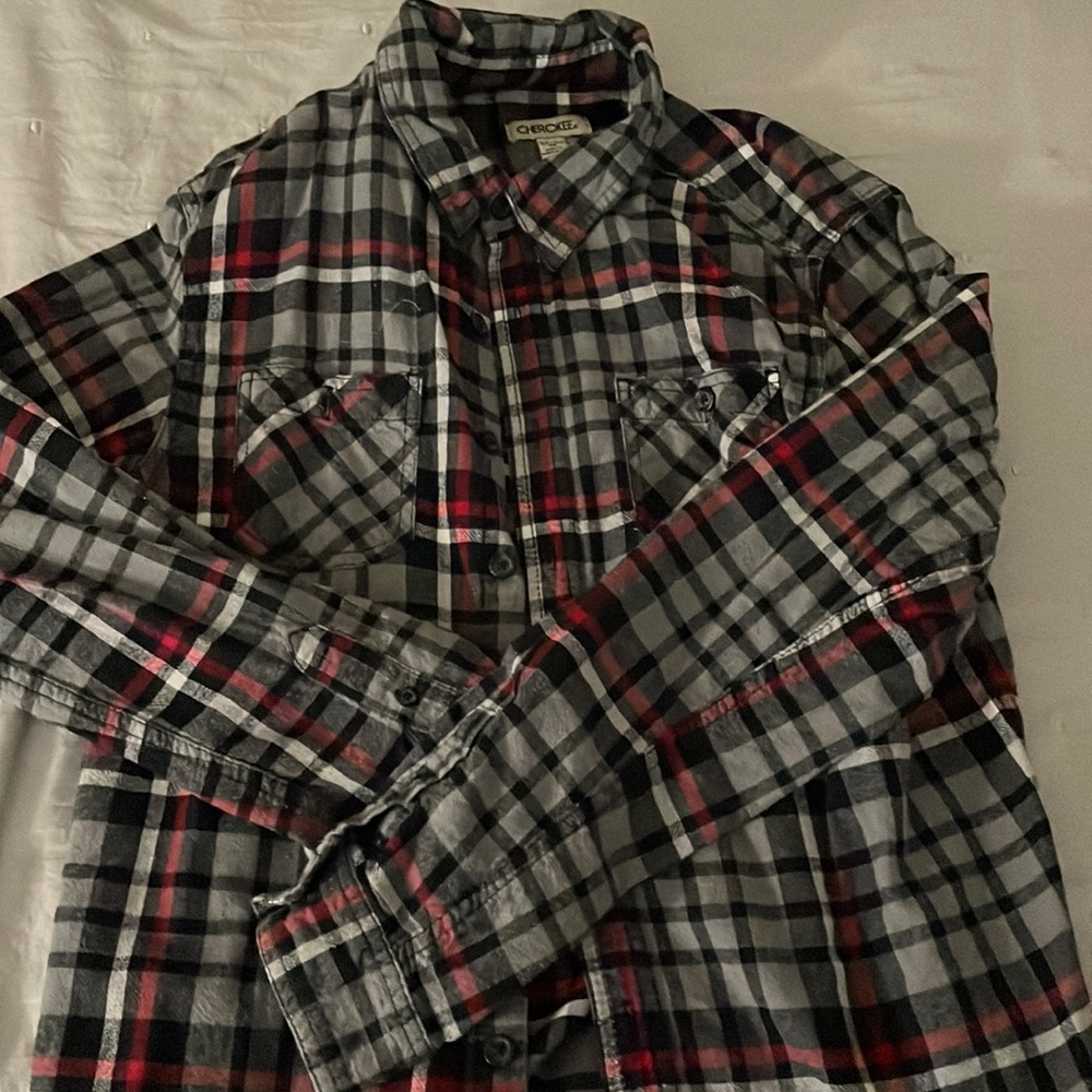 It’s a long sleeve button down polo shirt, men and women can wear it.
